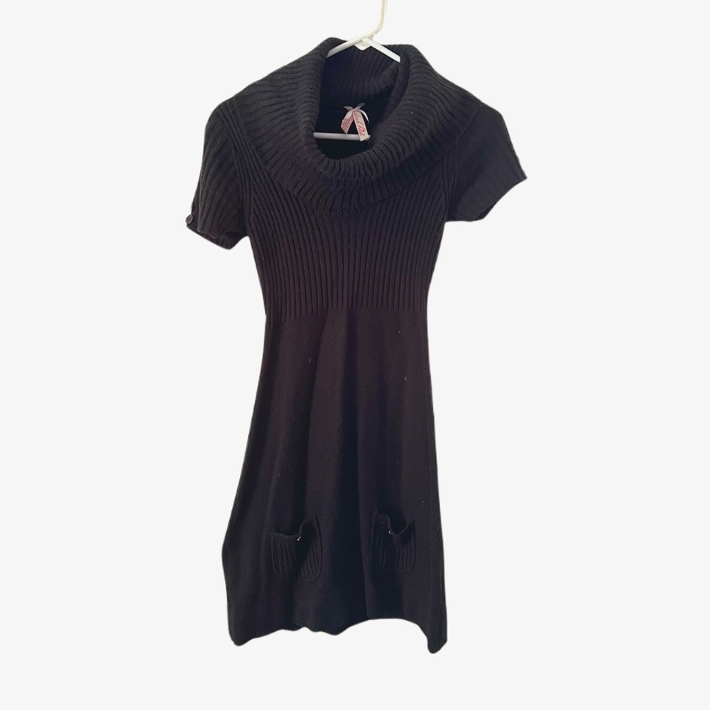 Snug black knit dress with cowl neckline and pockets